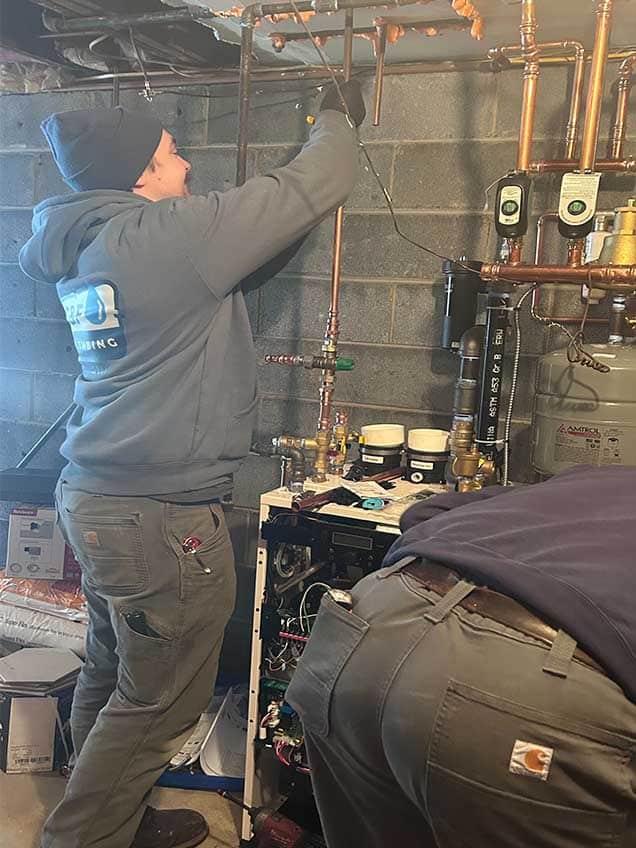 Candf Specialist Inspecting Water Heater