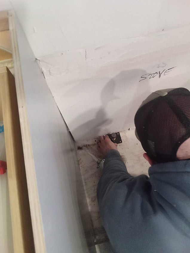 Plumber Installing Gas Line Connection